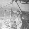 Корнев П. матрос 1-ого класса  занят выгрузкой улова из невода на плавбазу - СРТР-9110 16 11 1976