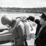Гордон Арно, моторист,одевает в костюм водолаза ДОСААФ Таллинской танции ОСВОД Марта Павловского- 1961