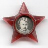 мне нравилась эта  Октябрятская звездочка и портрет Ильича в детстве