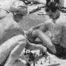 Дроздин Н. моторист и 2-й механик Г. Суханов играют в шахматы  на борту ПБ Украина во время смены экипажа –  БМРТ-355 август  1966